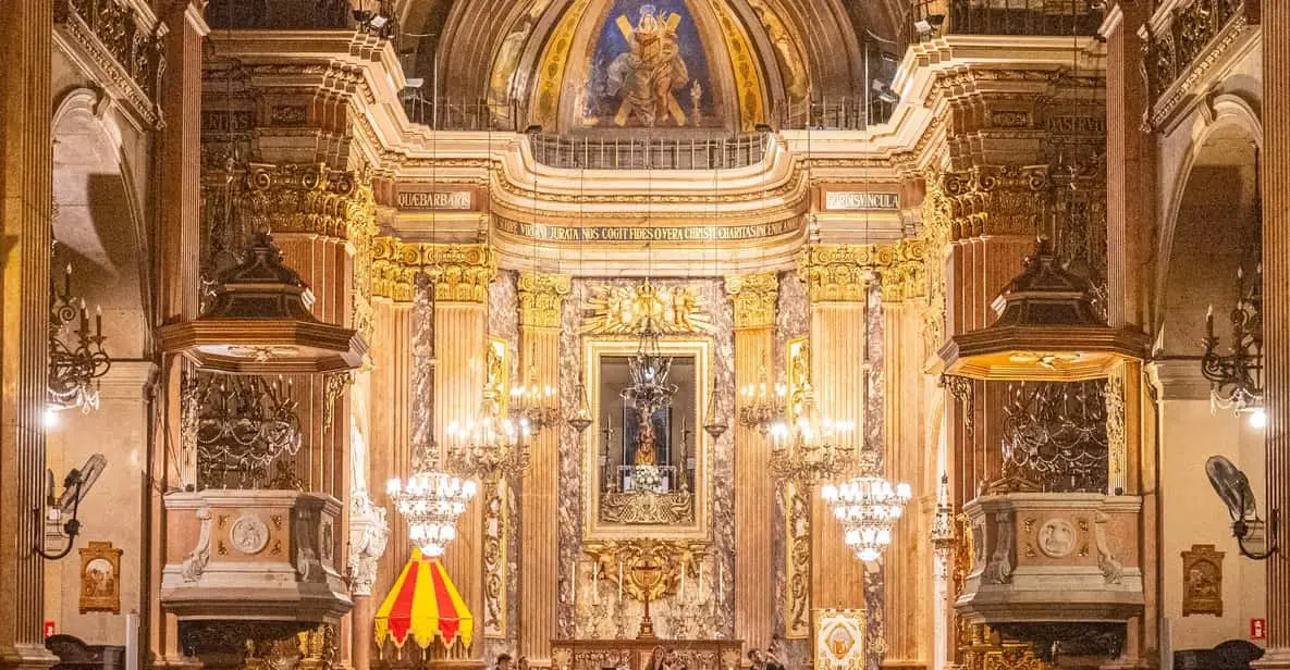 Candlelit string ensemble performing Vivaldi in a historic hall in Barcelona, Spain